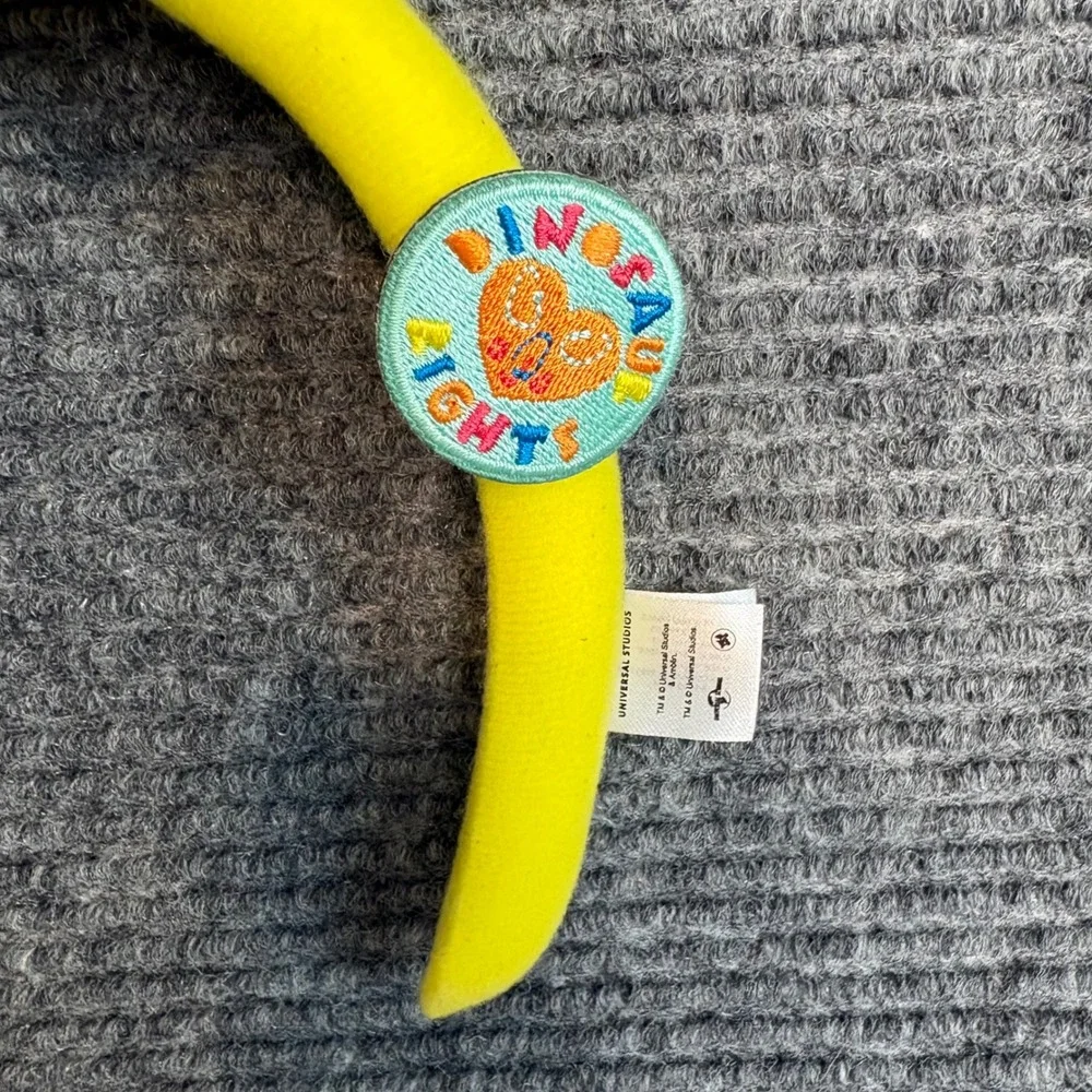 Jurassic World Universal Studios Dinosaur Headband Yellow Plush Triceratops NWT